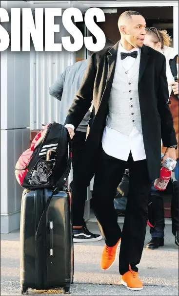  ?? — DARREN MAKOWICHUK ?? Eric Rogers and his Stampeders teammates leave McMahon Stadium yesterday en route to the 106th Grey Cup in Edmonton, where they will face Ottawa.