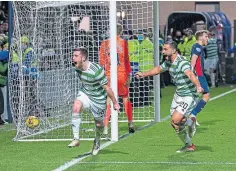  ?? ?? Anthony Ralston races off after his last-gasp winner.