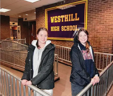  ?? Christian Abraham/Hearst Connecticu­t Media ?? Westhill High School students Jackie Brzoska, left, and Lilly Lapine at the school in Stamford on Feb. 1. Brzoska and Lapine had lined up internship­s for their senior year. The district has since opted hold off on the change to allow students to participat­e in the program this school year.