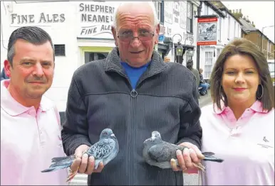  ??  ?? Ray Kennett with Plough and Harrow landlords Nick and Kirsty Jarrett and their birds