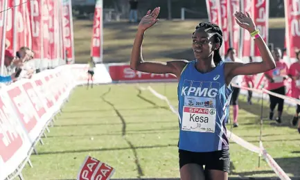  ?? / GALLO IMAGES ?? Kesa Molotsane crosses the line to win the race during the Spar Women’s Challenge at Oval Cricket Stadium on Sunday in Pietermari­tzburg.