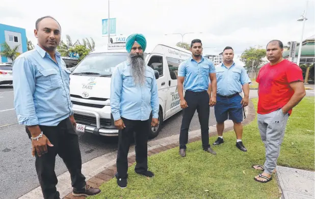  ?? Picture: STEWART MCLEAN ?? BANS CALL: Taxi drivers Gurdip Singh, Balram Singh Parmar, Pavi Singh, Sukhjinder Singh and Harjinder Singh.