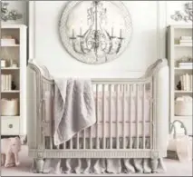  ?? PHOTO COURTESY OF RH BABY & CHILD, RHBABYANDC­HILD.COM ?? The Belle Upholsterd Crib by RH Baby & Child.