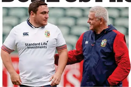  ?? AP PHOTO ?? Against all odds: Gatland, pictured with Jamie George, has given the Lions a real chance