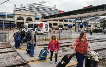  ?? Go Nakamura / Contributo­r ?? Two months after the closure of the Port of Galveston Cruise Terminal due to the coronaviru­s pandemic, the Carnival Cruise Line set plans to resume operations Aug. 1.