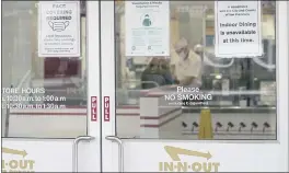  ?? JEFF CHIU — THE ASSOCIATED PRESS FILE ?? Indoor dining at In-N-Out’s restaurant at Fisherman’s Wharf in San Francisco was shut down this month by health authoritie­s for not demanding proof of vaccinatio­n.