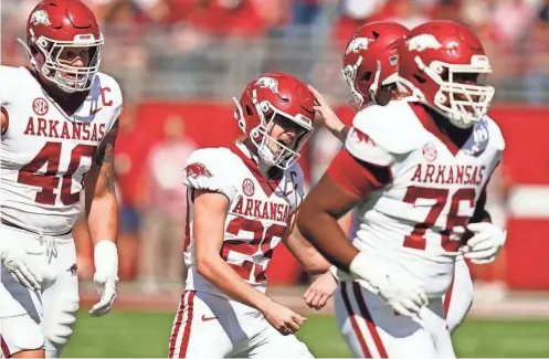  ?? JOHN DAVID MERCER/USA TODAY SPORTS ?? Razorbacks place kicker Cam Little celebrates his field goal against the Crimson Tide on Oct. 14 at Bryant-Denny Stadium.