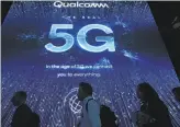  ?? Robyn Beck / AFP / Getty Images ?? Qualcomm is defending itself in a San Jose court against FTC accusation­s that it overcharge­s for its industryfo­unding intellectu­al property.