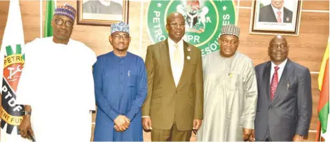  ?? ?? Group Managing Director ( GMD) Nigeria National Petroleum Corporatio­n ( NNPC) Mallam Mele Kyari( left); Chief Executive Officer ( CEO) Midstream & Downstream Petroleuem Regulatory Authority ( MDPRA) Engr. Farouk Ahmed; Minister of State Petroleum Resources Chief Timipre Sylva; Permanent Secretary Ministry of Petroleum Resources Dr Nasir Sani- Gwarzo and CEO Nigeria Upstream Petroleum Regulatory Commission ( NUPRC) Engr Gbenga Komolafe, shortly after the inaugurati­on of the two agencies, by the minister, at NNPC Towers, Abuja... yesterday.