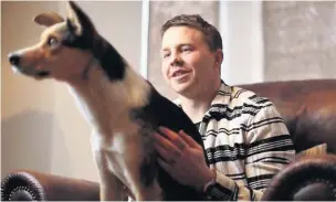  ??  ?? Scarlets and Wales flanker James Davies with his dog Desmond and, below, in action for Scarlets.