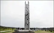  ?? KEITH SRAKOCIC / ASSOCIATE PRESS ?? People attend the dedication of the 93-foot-tall Tower of Voices at the Flight 93 National Memorial in Shanksvill­e, Pa., on Sunday.