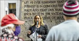  ?? GAELEN MORSE / COLUMBUS DISPATCH ?? Tamie Wilson, founder of The Aunt Linda Foundation and a U.S. Congressio­nal candidate, speaks during the Rally Against Domestic Violence at the Ohio Statehouse on Saturday.