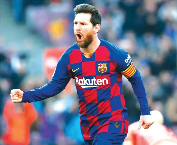  ??  ?? FILE - In this Saturday, Feb. 22, 2020 file photo, Barcelona’s Lionel Messi celebrates after scoring his side’s opening goal during a Spanish La Liga match between Barcelona and Eibar at the Camp Nou stadium in Barcelona. Photo: AP