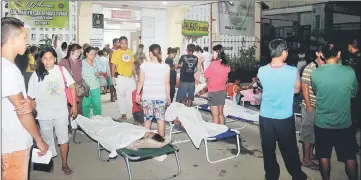  ??  ?? Injured victims seeks medical treatment at Caraga Regional hospital after an earthquake hit Surigao City, southern Philippine­s. — Reuters photo