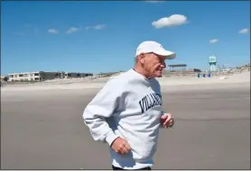  ?? COURTESY OF SEVEN MILE TIMES ?? Former Villanova great Dave Patrick runs on the beach in Stone Harbor, N.J.