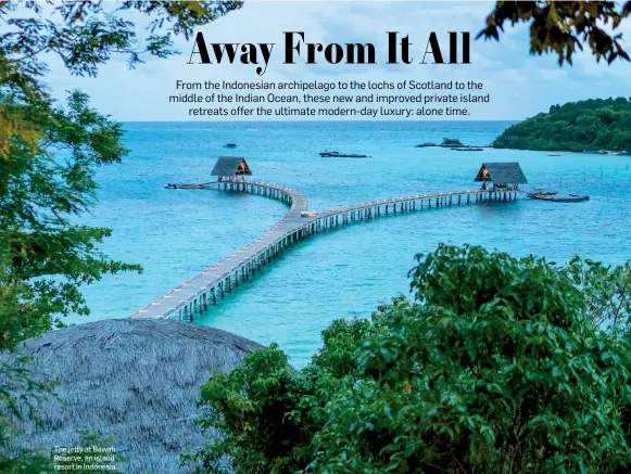  ??  ?? The jetty at Bawah Reserve, an island resort in Indonesia.