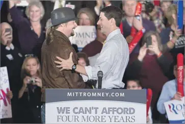  ?? Scott Legato Getty Images ?? KID ROCK with Rep. Paul D. Ryan in 2012. The rocker is polling well in Michigan after floating a GOP run.