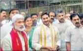  ?? HT PHOTO ?? YSR Congress president Jagan Mohan Reddy (centre) has been visiting temples frequently, setting aside his faith.