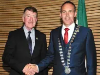  ??  ?? Cllr Ian Doyle, Deputy Mayor of Cork County congratula­tes Cllr Declan Hurley who was elected Mayor of Cork County at County Hall Cork.