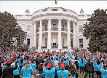  ?? ALEX BRANDON/AP ?? Hundreds of supporters cheer as President Donald Trump appears on a balcony of the White House on Saturday.