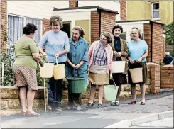  ??  ?? DESPERATE MEASURES: Queueing at a water standpipe in 1976