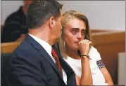  ?? MATT WEST — THE BOSTON HERALD VIA AP, POOL ?? Michelle Carter awaits her sentencing in a courtroom in Taunton, Mass., on Thursday for involuntar­y manslaught­er.