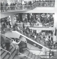  ?? MATTHEW SHERWOOD / POSTMEDIA NEWS ?? Toronto’s Eaton Centre is North America’s busiest mall.