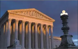  ?? J. Scott Applewhite Associated Press ?? THE 5- 4 ruling by the U. S. Supreme Court said courts shouldn’t allow class arbitratio­n unless an agreement clearly authorizes that type of proceeding.