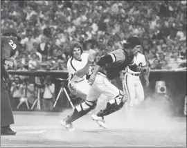  ?? ASSOCIATED PRESS FILE —1979 ?? Former Giants catcher Mike Sadek, shown here chasing the ball as Pete Rose crosses the plate, died at age 74, the team announced.