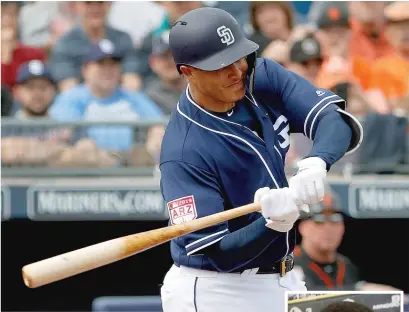  ?? MATT YORK/AP ?? Manny Machado (above) didn’t seem like a superstar in a B game Friday, when the Sox’ Ervin Santana (inset) retired him five times in five plate appearance­s.