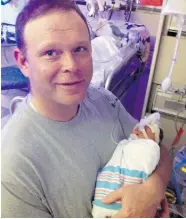  ??  ?? Darren Kimmel with baby Reece Kimmel shortly after her premature birth in Hawaii on Dec. 10, 2013. Blue Cross has refused to pay the $950,000 bill incurred by the birth.