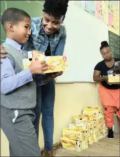  ??  ?? A moment of joy for a Bellville Suid Primary pupil.