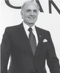  ?? PAUL CHIASSON / THE CANADIAN PRESS FILES ?? Air Canada chief executive Calin Rovinescu on Friday rejected claims that Air Canada’s offer for Aimia Inc.’s Aeroplan reward program was a hostile bid.