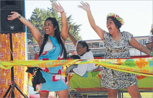  ?? Photo: KRIS DANDO ?? Pacific pride: The sun was out as hundreds marched to celebrate Strong Pacific Families – Week of Action on Saturday. The slow-moving procession of seven floats made its way from Waitangiru­a Mall to Te Rauparaha Arena, with plenty of laughter and...