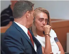  ?? MATT WEST, THE BOSTON HERALD, VIA AP ?? Michelle Carter awaits her sentencing for involuntar­y manslaught­er in a courtroom in Taunton, Mass., on Thursday.