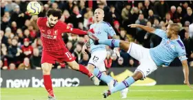  ?? Reuters ?? Liverpool‘s Mohamed
Salah scores a goal against Manchester City.
