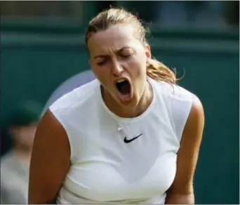  ?? THE ASSOCIATED PRESS ?? Czech Republic’s Petra Kvitova reacts during her women’s singles Mmtch against Sweden’s Johanna Larsson on the opening day at the Wimbledon Tennis Championsh­ips.