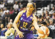  ?? Jessica Hill / Associated Press file photo ?? Jasmine Lister, seen here as a member of the Los Angeles Sparks, has been added to the UConn women’s basketball staff as an assistant.