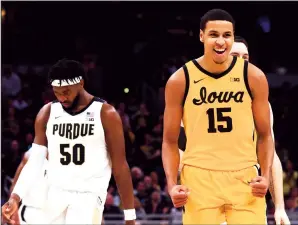  ?? JUSTIN CASTERLINE/GETTY IMAGES ?? Iowa's Keegan Murray (15) reacts after a play against Purdue during the Big Ten Championsh­ip on March 13 in Indianapol­is.