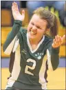  ?? JASON MALLOY/THE GUARDIAN ?? Jillian Ferguson, a Grade 12 member of the Kensington Intermedia­te Senior High Torchettes volleyball team, celebrates a second set point Friday at the Prince Edward Island School Athletic Associatio­n senior AAA girls’ volleyball final.