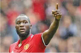  ?? — AFP photo ?? This file photo taken on September 30, 2017 shows Manchester United’s Belgian striker Romelu Lukaku as he celebrates scoring the team’s fourth goal during the English Premier League football match between Manchester United and Crystal Palace at Old...