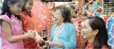  ??  ?? CHINESE the world over are celebratin­g the dawn of a new year, the Year of the Pig. In First Chinatown, Johannesbu­rg, Christine Pon, 5, and Gabrielle Pon, 9, wish 106-year-old great grandmothe­r Ng Shue Chee Pon and Leanne Pon a very happy Chinese New Year Kung Hei Fat Choy. | KAREN SANDISON African News Agency (ANA)