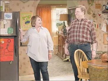  ?? Adam Rose ABC ?? ROSEANNE BARR back in her living-room set with costar John Goodman and most of original cast in tow.