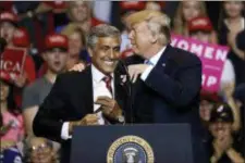  ?? MATT ROURKE — THE ASSOCIATED PRESS ?? President Donald Trump, right, greets Senate candidate Rep. Lou Barletta, R-Pa., during a rally in Wilkes-Barre, Pa.