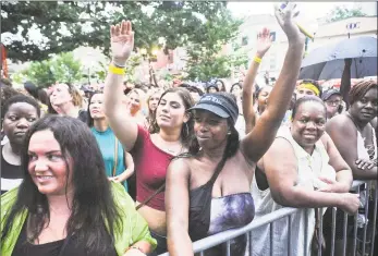  ?? Matthew Brown / Hearst Connecticu­t Media ?? Music fans pack into Columbus Park for the annual Alive@Five summer concert series in Stamford on July 11.