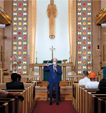  ??  ?? SPEAKING OUT FOR RACIAL JUSTICE
BLM protests in Westbury, New York in June (opposite) and Joe Biden speaks in Kenosha, Wisconsin, in the aftermath of the police shooting of Jacob Blake (left).