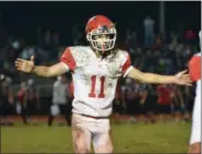  ?? THOMAS NASH - DIGITAL FIRST MEDIA ?? Owen J. Roberts’ Bryce Pippin (11) celebrates with teammates during the fourth quarter of Friday night’s win over Boyertown.