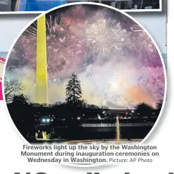  ?? Picture: AP Photo ?? Fireworks light up the sky by the Washington Monument during inaugurati­on ceremonies on Wednesday in Washington.