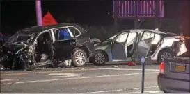  ?? MARK LIEB — ROCKLAND VIDEO PRODUCTION­S ?? The Porsche SUV, left, that was fleeing police is shown after the July 1, 2018, crash in Lloyd, N.Y. The Toyota at right struck the rear of the SUV at the end of the incident.