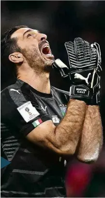  ?? Marco Bertorello/AFP ?? O goleiro Buffon, capitão da Itália, na partida em Milão